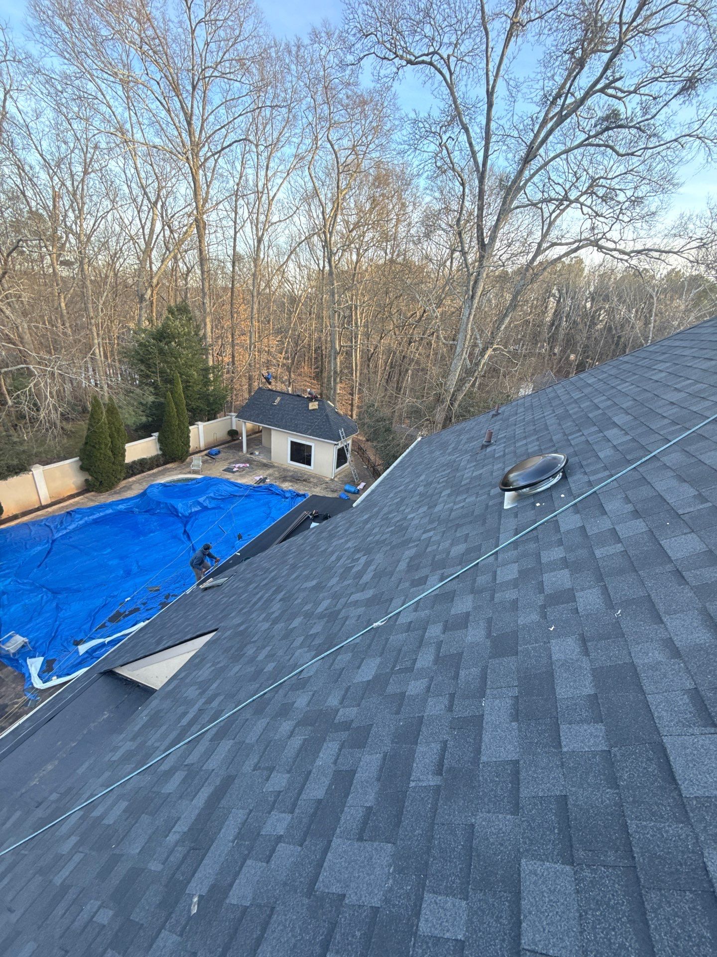 Roofing crew performing inspection in Dacula, GA